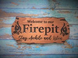 Wooden Carved Sign with Campfire