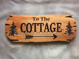Arrow Directional Sign with Pine Trees
