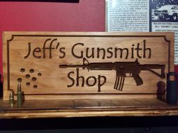 Weaponry Sign with AK and Bullet Holes