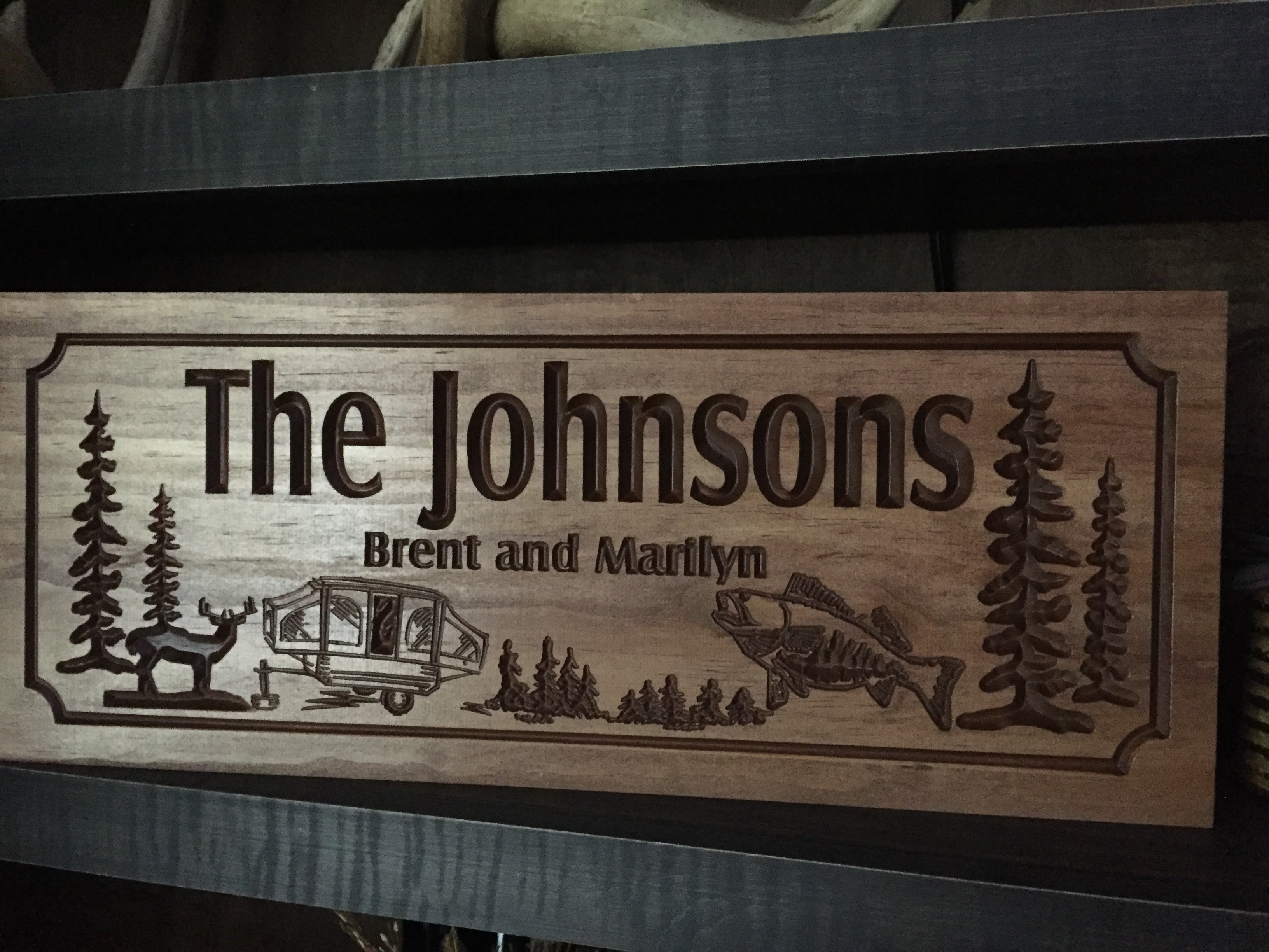 Pine Trees With Camper: benchmarksignsandgifts.com